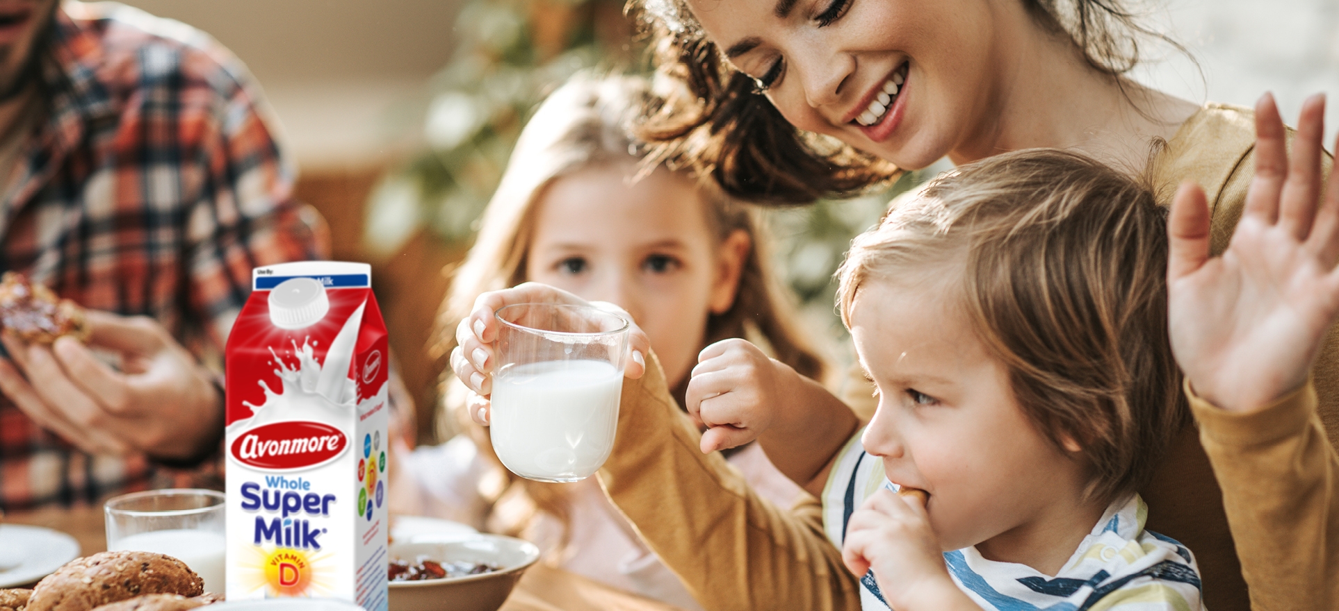 an image of a family  enjoying super milk